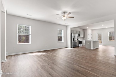 The Givens offers a beautifully crafted two-story design that on Harbour Point Golf Club in North Carolina - for sale on GolfHomes.com, golf home, golf lot