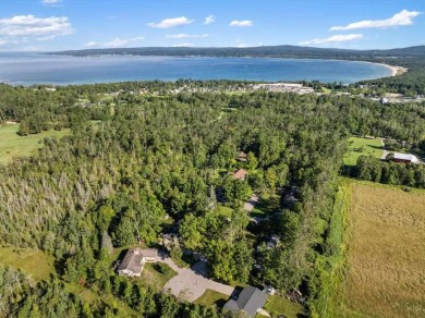 Tucked away on a quiet cul-de-sac just behind the Bay View Golf on Petoskey-Bay View Country Club in Michigan - for sale on GolfHomes.com, golf home, golf lot