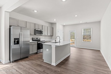 The Givens offers a beautifully crafted two-story design that on Harbour Point Golf Club in North Carolina - for sale on GolfHomes.com, golf home, golf lot