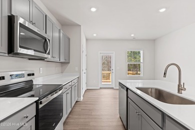 The Givens offers a beautifully crafted two-story design that on Harbour Point Golf Club in North Carolina - for sale on GolfHomes.com, golf home, golf lot