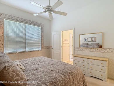 Fall in love with this picturesque Golf Course View heated pool on Citrus Hills Golf Club in Florida - for sale on GolfHomes.com, golf home, golf lot