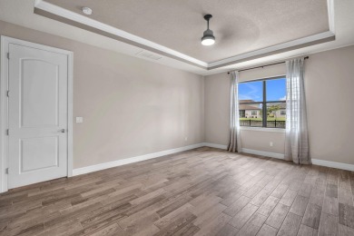 This stunning waterfront home, situated on a rare, ultra-premium on Jupiter Country Club in Florida - for sale on GolfHomes.com, golf home, golf lot