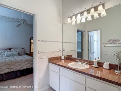 Fall in love with this picturesque Golf Course View heated pool on Citrus Hills Golf Club in Florida - for sale on GolfHomes.com, golf home, golf lot