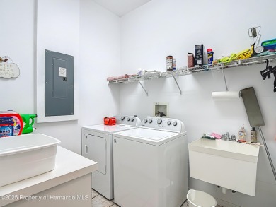 Fall in love with this picturesque Golf Course View heated pool on Citrus Hills Golf Club in Florida - for sale on GolfHomes.com, golf home, golf lot