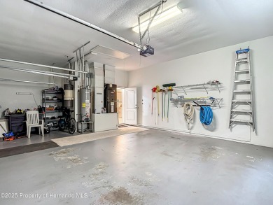 Fall in love with this picturesque Golf Course View heated pool on Citrus Hills Golf Club in Florida - for sale on GolfHomes.com, golf home, golf lot