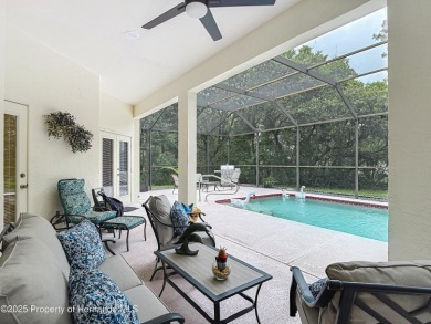 Fall in love with this picturesque Golf Course View heated pool on Citrus Hills Golf Club in Florida - for sale on GolfHomes.com, golf home, golf lot