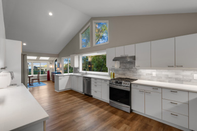 Inviting, Open Living with Lake Keowee & Blue Ridge Mountain View on Keowee Key Golf and Country Club in South Carolina - for sale on GolfHomes.com, golf home, golf lot