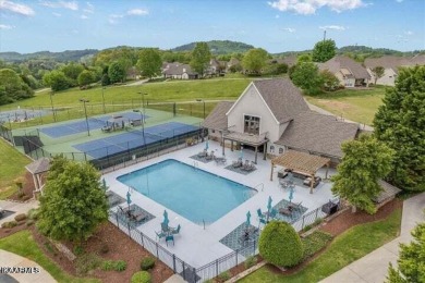 This beautiful  waterfront access home site is situated in a on Rarity Bay Golf and Country Club - Monroe in Tennessee - for sale on GolfHomes.com, golf home, golf lot