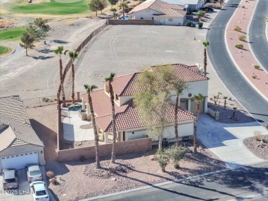 This spacious 2-story custom pool home in the gated Los Lagos on Los Lagos Golf Club in Arizona - for sale on GolfHomes.com, golf home, golf lot