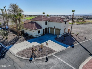This spacious 2-story custom pool home in the gated Los Lagos on Los Lagos Golf Club in Arizona - for sale on GolfHomes.com, golf home, golf lot