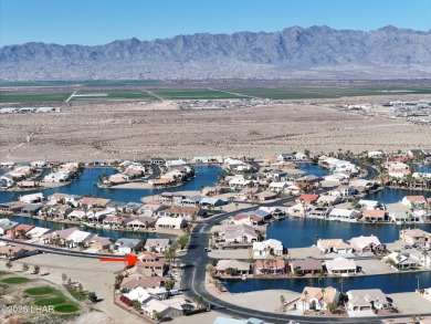 This spacious 2-story custom pool home in the gated Los Lagos on Los Lagos Golf Club in Arizona - for sale on GolfHomes.com, golf home, golf lot