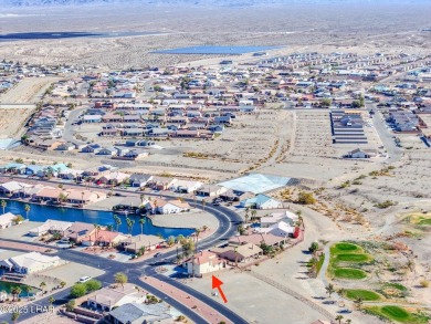This spacious 2-story custom pool home in the gated Los Lagos on Los Lagos Golf Club in Arizona - for sale on GolfHomes.com, golf home, golf lot