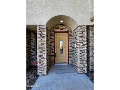 This spacious 2-story custom pool home in the gated Los Lagos on Los Lagos Golf Club in Arizona - for sale on GolfHomes.com, golf home, golf lot
