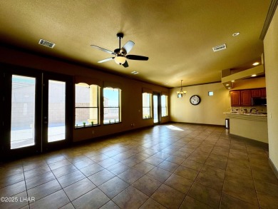 This spacious 2-story custom pool home in the gated Los Lagos on Los Lagos Golf Club in Arizona - for sale on GolfHomes.com, golf home, golf lot