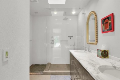 A one-of-a-kind, light-filled home with gorgeous grounds that on Squaw Creek Golf Club in Texas - for sale on GolfHomes.com, golf home, golf lot