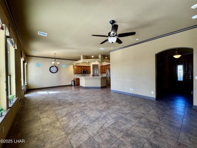 This spacious 2-story custom pool home in the gated Los Lagos on Los Lagos Golf Club in Arizona - for sale on GolfHomes.com, golf home, golf lot
