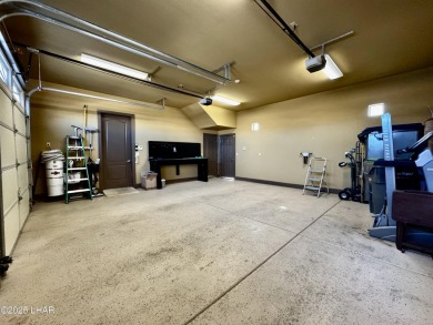 This spacious 2-story custom pool home in the gated Los Lagos on Los Lagos Golf Club in Arizona - for sale on GolfHomes.com, golf home, golf lot