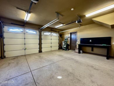 This spacious 2-story custom pool home in the gated Los Lagos on Los Lagos Golf Club in Arizona - for sale on GolfHomes.com, golf home, golf lot