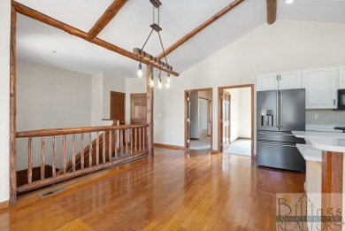 The beautiful wood floors are a defining feature at this great on Red Lodge Golf Club in Montana - for sale on GolfHomes.com, golf home, golf lot