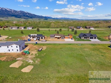 This new construction one level modern farmhouse is being built on Red Lodge Golf Club in Montana - for sale on GolfHomes.com, golf home, golf lot