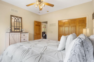 Nestled within the prestigious, gated, golf community of on Ledgestone Country Club and Golf Course in Missouri - for sale on GolfHomes.com, golf home, golf lot
