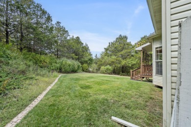 Nestled within the prestigious, gated, golf community of on Ledgestone Country Club and Golf Course in Missouri - for sale on GolfHomes.com, golf home, golf lot