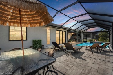 This stunning home offers a unique open-concept design, making on Royal Tee Country Club in Florida - for sale on GolfHomes.com, golf home, golf lot