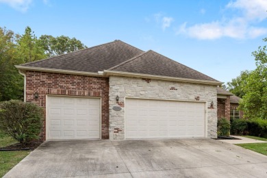 Nestled within the prestigious, gated, golf community of on Ledgestone Country Club and Golf Course in Missouri - for sale on GolfHomes.com, golf home, golf lot