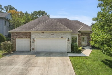 Nestled within the prestigious, gated, golf community of on Ledgestone Country Club and Golf Course in Missouri - for sale on GolfHomes.com, golf home, golf lot