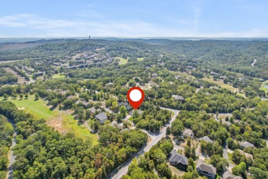 Nestled within the prestigious, gated, golf community of on Ledgestone Country Club and Golf Course in Missouri - for sale on GolfHomes.com, golf home, golf lot