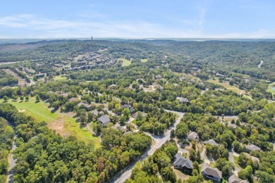 Nestled within the prestigious, gated, golf community of on Ledgestone Country Club and Golf Course in Missouri - for sale on GolfHomes.com, golf home, golf lot