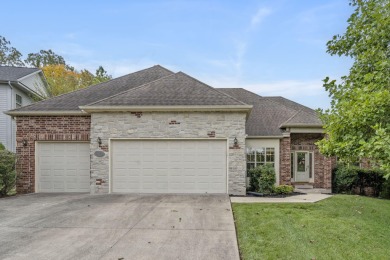 Nestled within the prestigious, gated, golf community of on Ledgestone Country Club and Golf Course in Missouri - for sale on GolfHomes.com, golf home, golf lot