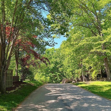 Experience the feeling of living in a treehouse in this bright on The Eagle Pointe Golf Resort in Indiana - for sale on GolfHomes.com, golf home, golf lot