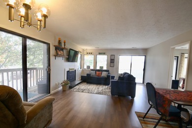 Experience the feeling of living in a treehouse in this bright on The Eagle Pointe Golf Resort in Indiana - for sale on GolfHomes.com, golf home, golf lot