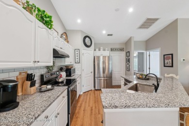 This beautifully updated 2-bedroom, 2-bathroom villa with a on Tampa Bay Golf and Country Club in Florida - for sale on GolfHomes.com, golf home, golf lot