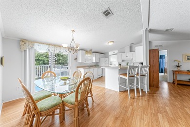 Enjoy easy coastal living in this fully furnished 3-bedroom on Barefoot Bay Golf Course in Florida - for sale on GolfHomes.com, golf home, golf lot