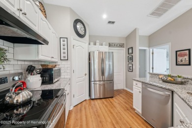 This beautifully updated 2-bedroom, 2-bathroom villa with a on Tampa Bay Golf and Country Club in Florida - for sale on GolfHomes.com, golf home, golf lot