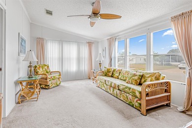 Enjoy easy coastal living in this fully furnished 3-bedroom on Barefoot Bay Golf Course in Florida - for sale on GolfHomes.com, golf home, golf lot