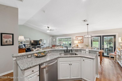 This beautifully updated 2-bedroom, 2-bathroom villa with a on Tampa Bay Golf and Country Club in Florida - for sale on GolfHomes.com, golf home, golf lot