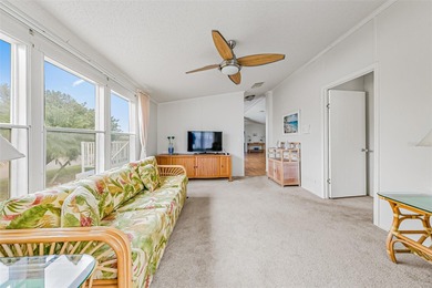 Enjoy easy coastal living in this fully furnished 3-bedroom on Barefoot Bay Golf Course in Florida - for sale on GolfHomes.com, golf home, golf lot