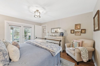 This beautifully updated 2-bedroom, 2-bathroom villa with a on Tampa Bay Golf and Country Club in Florida - for sale on GolfHomes.com, golf home, golf lot