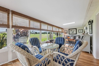 This beautifully updated 2-bedroom, 2-bathroom villa with a on Tampa Bay Golf and Country Club in Florida - for sale on GolfHomes.com, golf home, golf lot