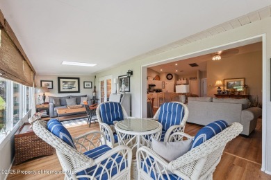This beautifully updated 2-bedroom, 2-bathroom villa with a on Tampa Bay Golf and Country Club in Florida - for sale on GolfHomes.com, golf home, golf lot