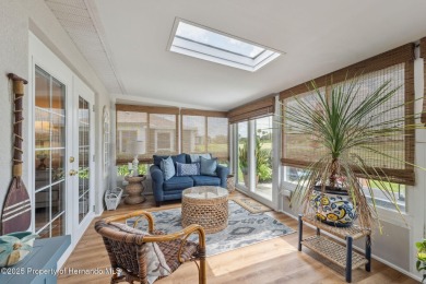 This beautifully updated 2-bedroom, 2-bathroom villa with a on Tampa Bay Golf and Country Club in Florida - for sale on GolfHomes.com, golf home, golf lot