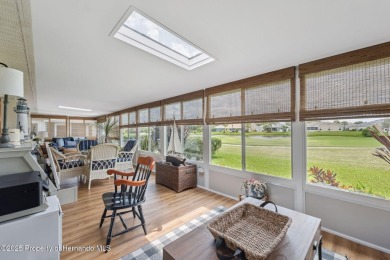 This beautifully updated 2-bedroom, 2-bathroom villa with a on Tampa Bay Golf and Country Club in Florida - for sale on GolfHomes.com, golf home, golf lot