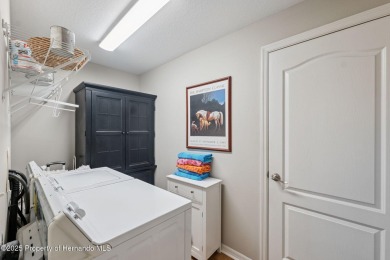 This beautifully updated 2-bedroom, 2-bathroom villa with a on Tampa Bay Golf and Country Club in Florida - for sale on GolfHomes.com, golf home, golf lot