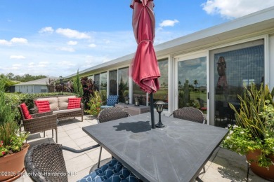 This beautifully updated 2-bedroom, 2-bathroom villa with a on Tampa Bay Golf and Country Club in Florida - for sale on GolfHomes.com, golf home, golf lot