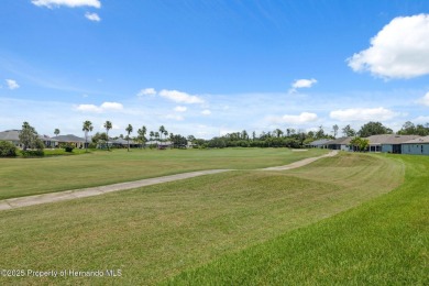 This beautifully updated 2-bedroom, 2-bathroom villa with a on Tampa Bay Golf and Country Club in Florida - for sale on GolfHomes.com, golf home, golf lot