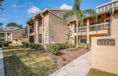 Enjoy gorgeous views and maintenance free living with this much on East Lake Woodlands Country Club in Florida - for sale on GolfHomes.com, golf home, golf lot