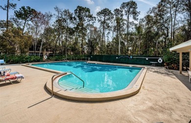 Enjoy gorgeous views and maintenance free living with this much on East Lake Woodlands Country Club in Florida - for sale on GolfHomes.com, golf home, golf lot